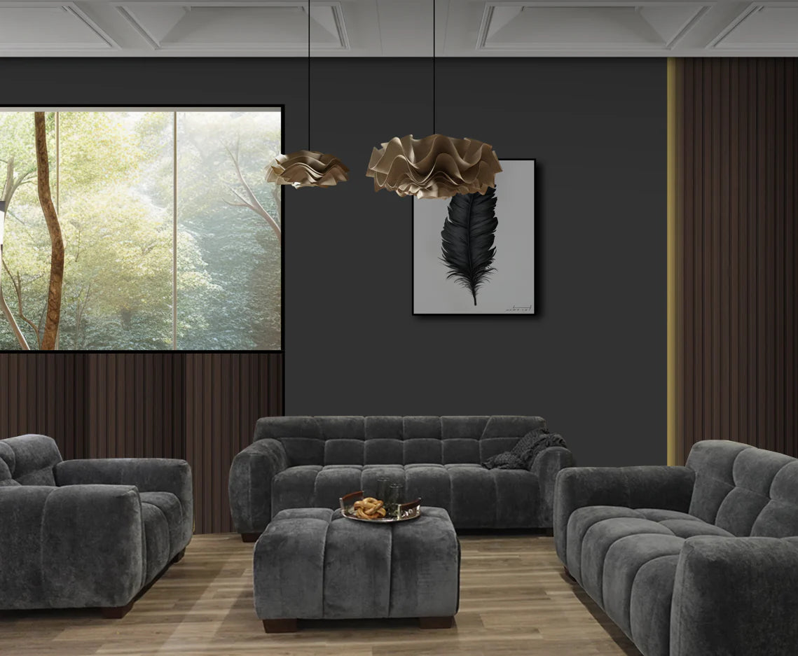 Harlem sofa set in steel velvet installed in a modern UK living room, showing 3 seater, 2 seater, armchair and stool arranged together with elegant channel stitching and contemporary décor solid furniture UK