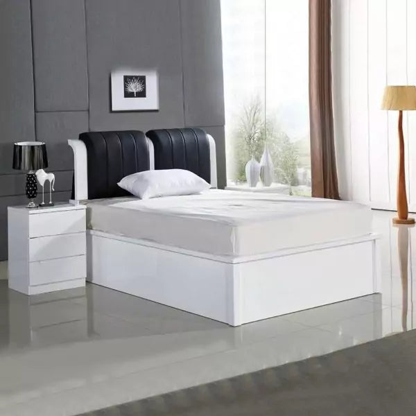 High Gloss Rugby Ottoman Storage Bed in White with Black Leather Upholstered Headboard Main View by Solid Furniture UK
