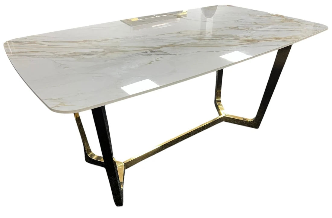 Jessica dining table from a side angle showing the geometric gold frame and ceramic surface, Solid Furniture UK