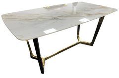 Jessica dining table from a side angle showing the geometric gold frame and ceramic surface, Solid Furniture UK