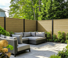 Khaki composite fencing installed in a landscaped garden by Solid Furniture UK for enhanced privacy and design