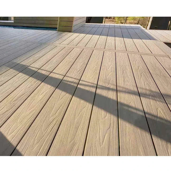 Close-up view of pack of 4 khaki outdoor decking boards 290cm from Solid Furniture LTD UK, installed outdoors in a garden patio, showing texture, grooves, and durable finish ideal for UK outdoor spaces