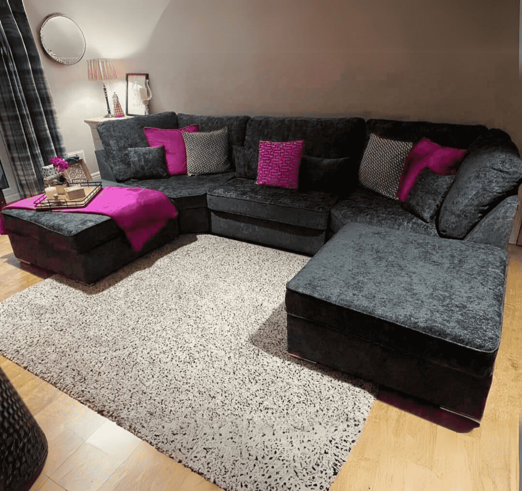 Angle view of Large Bishop U shape corner sofa in black plush velvet highlighting its modern U shape design SOLID FURNITURE LTD