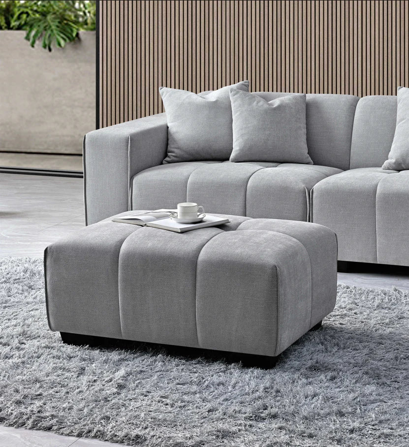 Leonard matching footstool in cloudy grey bouclé fabric, perfect companion to the corner sofa solid furniture UK