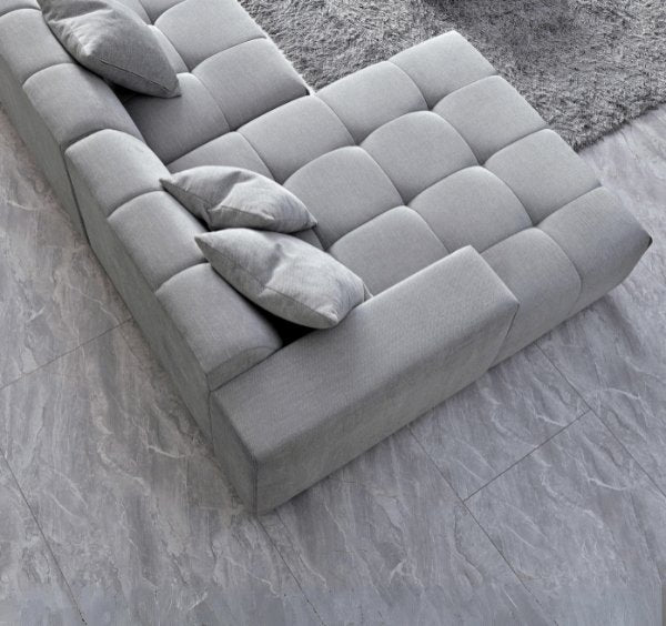 Leonard modular corner sofa with five scatter cushions in cloudy grey bouclé - SOLID FURNITURE LTD