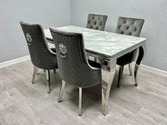 Modern Lewis Chrome Marble Dining Table with matching chairs, showcasing a luxury marble-effect tabletop and curved chrome stainless steel base in a contemporary dining room main view.