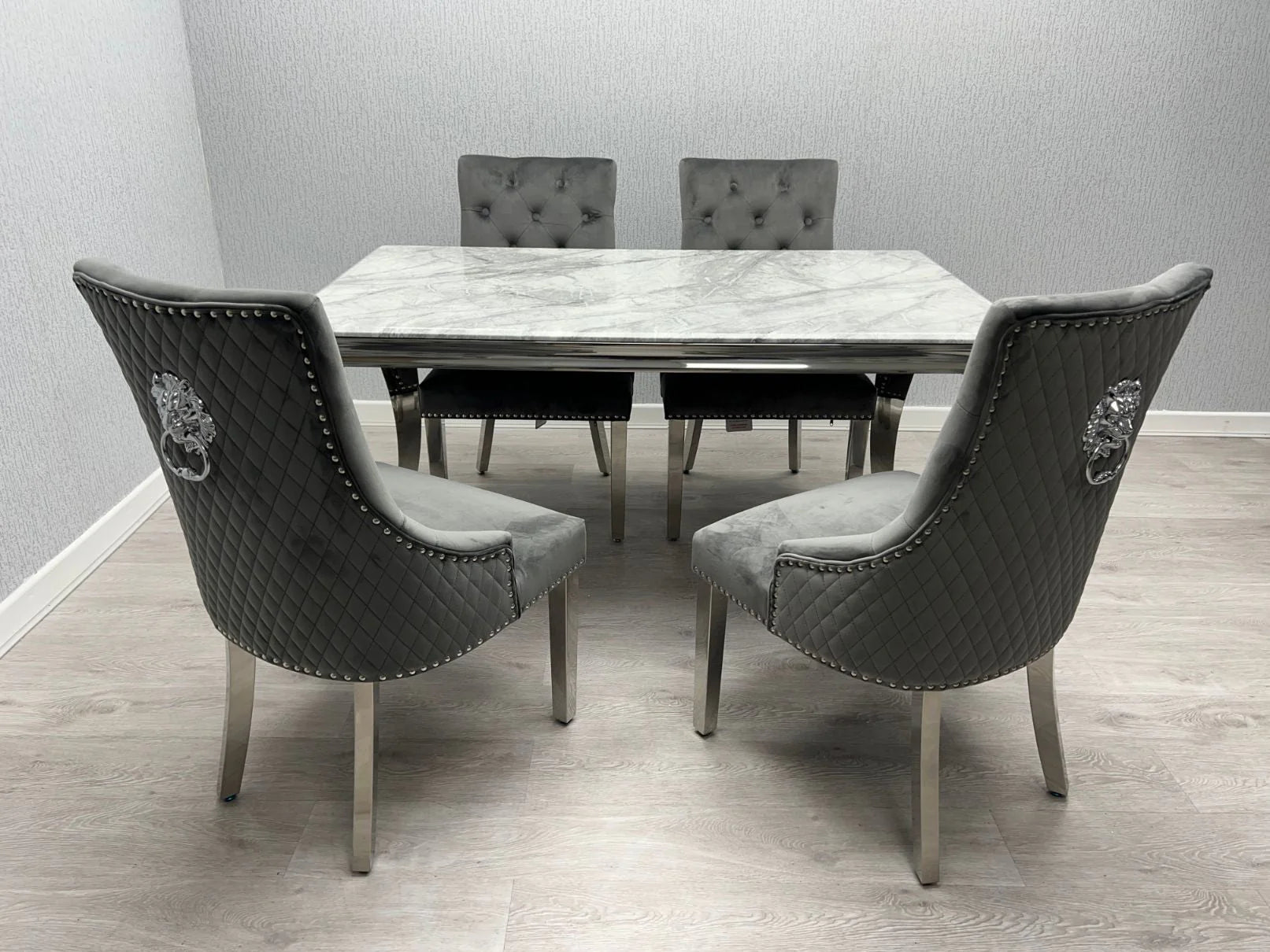 Lewis Chrome Marble Rectangular Dining Table with matching chairs featuring a luxury modern design, available at Solid Furniture UK.