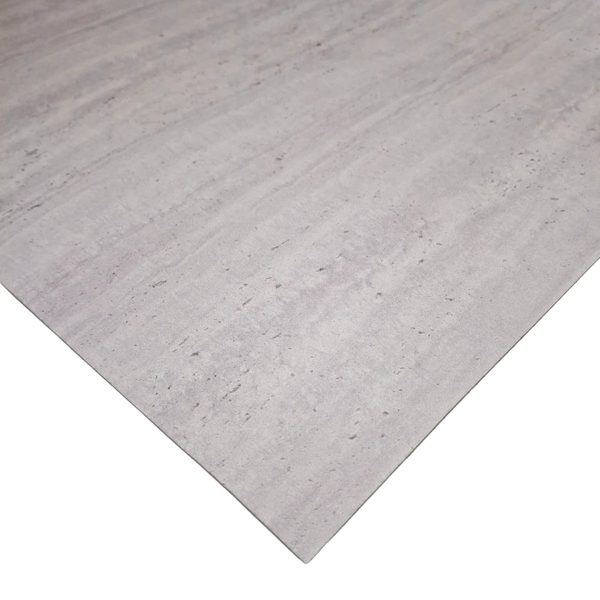 Side view of Light Grey MCM Travertine Stone Wall Tiles 120 x 60cm pack of 4 by Solid Furniture LTD showing tile thickness and flexible design