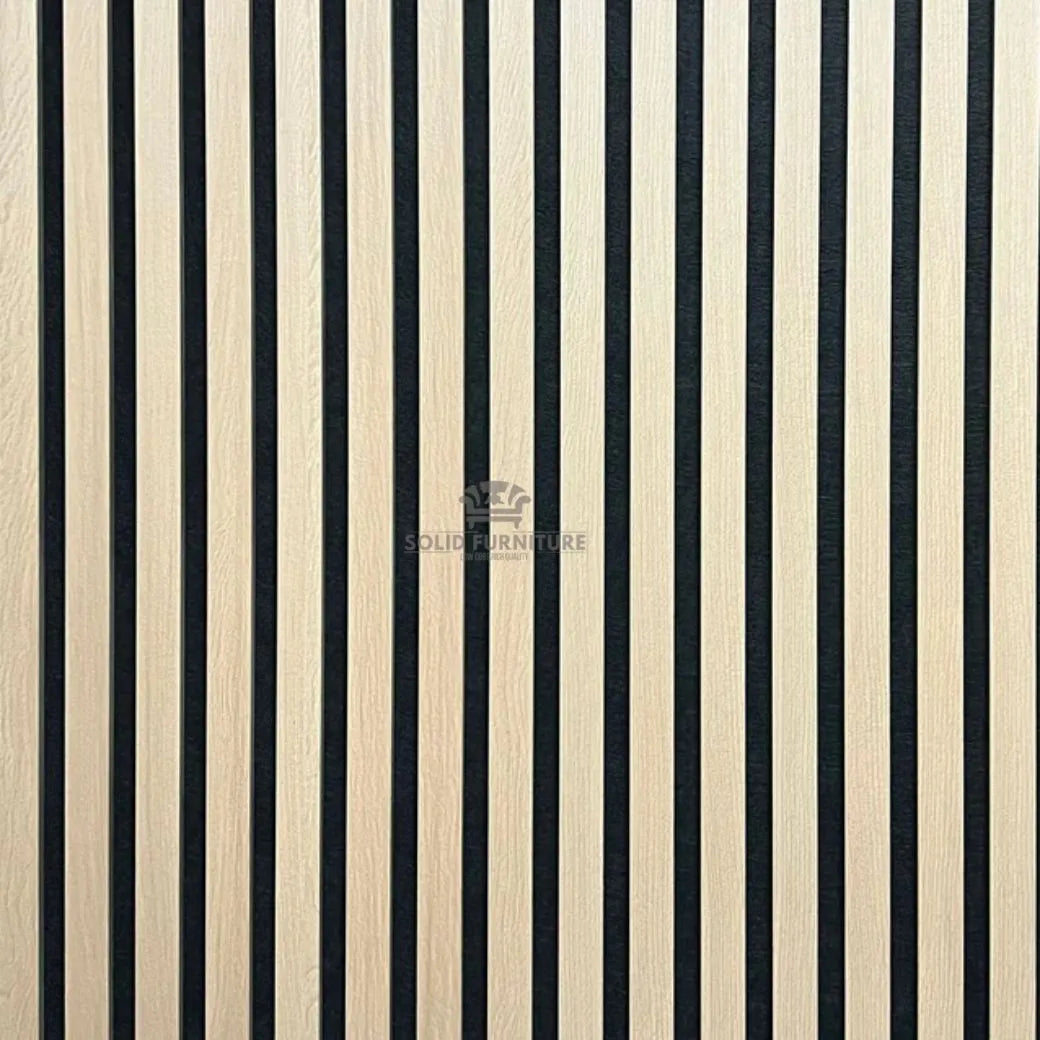 Close-up of real wood light oak acoustic wall panel showing slat spacing, wood grain texture, and acoustic felt backing.
