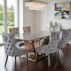London extendable grey ceramic dining table with chrome frame and chairs in a modern dining room by Solid Furniture UK