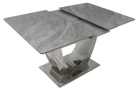 London grey ceramic extendable dining table shown in extended view with chrome frame by Solid Furniture UK