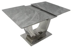 London grey ceramic extendable dining table shown in extended view with chrome frame by Solid Furniture UK
