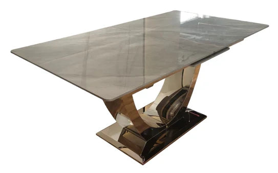 London grey ceramic extendable dining table side angle view with chrome U-shaped base by Solid Furniture UK