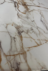 Close-up view of Louis gold marble dining table top Solid Furniture UK showing premium marble effect finish and smooth surface texture modern luxury design