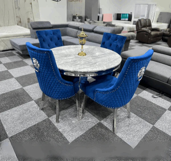 Angled perspective of luxury dining set by Solid Furniture UK showing marble table and velvet chairs in modern dining space