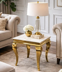 Louis lamp table with cream marble top and gold frame in a living room by Solid Furniture UK