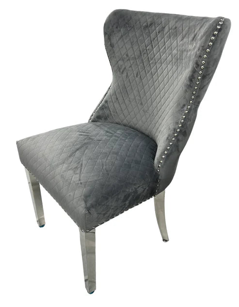 Louis Plush Dining Chair Dark Grey by Solid Furniture UK side angle view highlighting elegant modern design