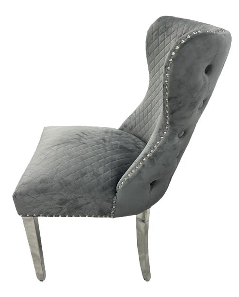 Louis Plush Dining Chair Dark Grey by Solid Furniture UK side view showing chrome legs and velvet upholstery
