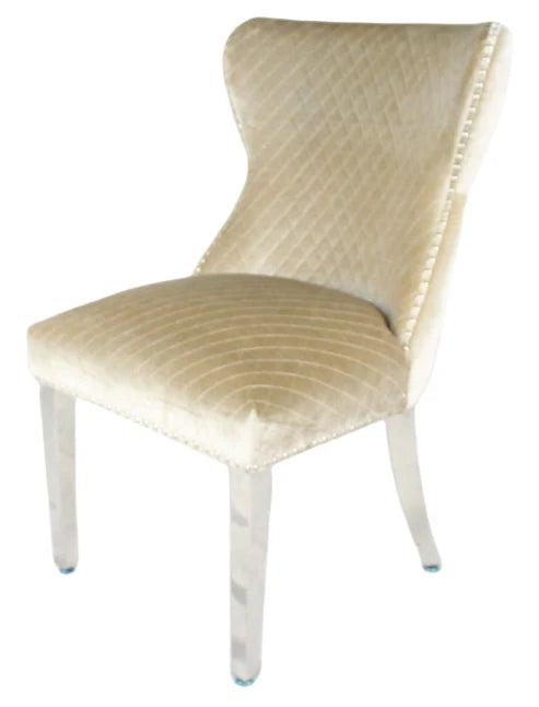 Louis Plush Dining Chair Mink by Solid Furniture UK side angle view showing luxury dining design