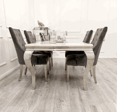 Side view of Louis Silver Grey marble effect dining set with grey velvet dining chairs from Solid Furniture UK