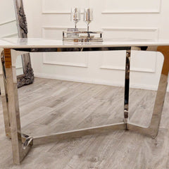 Close up detail of Lucien dining table by Solid Furniture UK with polar white sintered stone surface and chrome base