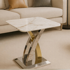 Lucy lamp table with cream marble top styled beside a sofa in a modern living room, Solid Furniture UK