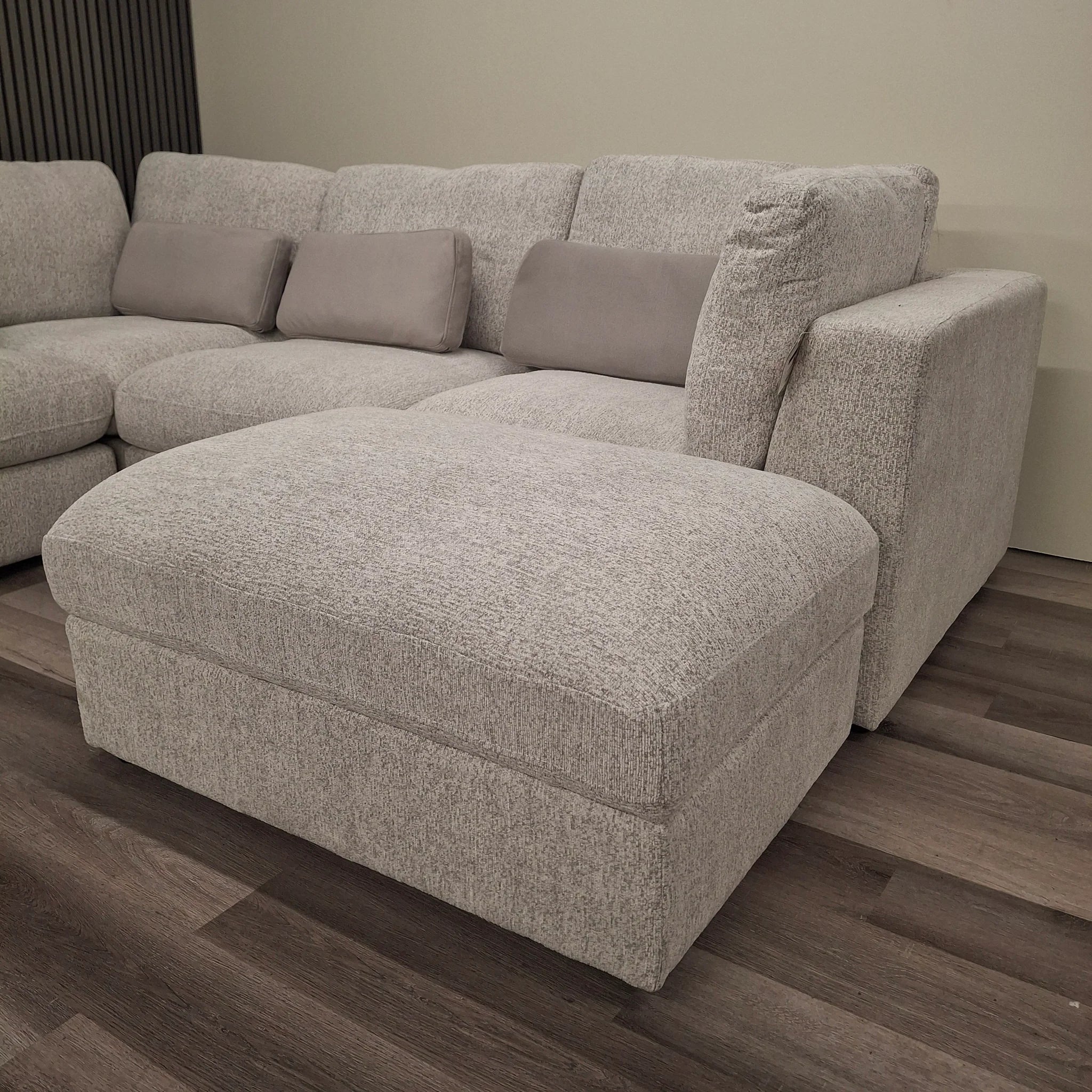 Madison U Shape Sofa corner view with storage ottoman footstool in soft chenille fabric showing spacious modular U-shaped seating design for modern living rooms. solid furniture UK
