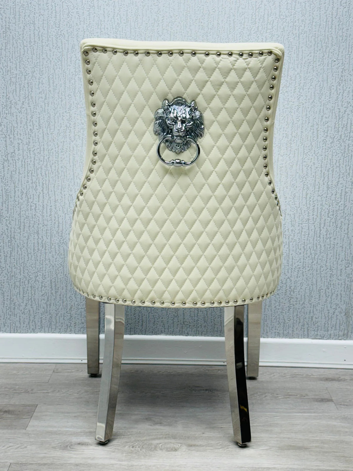 Majestic Cream PU Leather Dining Chair Back View with Lion Knocker Detail from Solid Furniture UK