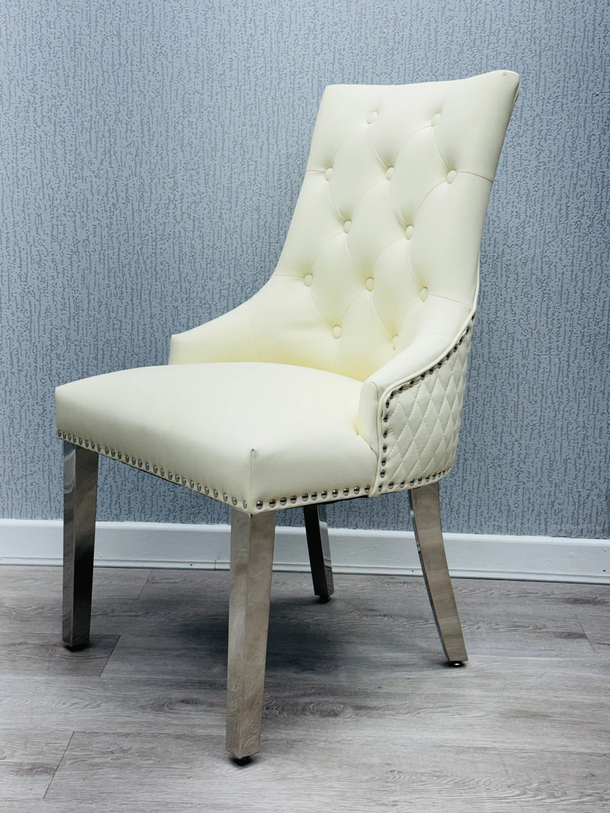 Majestic Cream PU Leather Dining Chair Side View with Elegant Upholstery Design from Solid Furniture UK