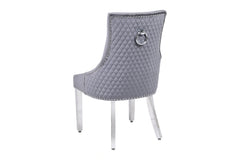 Back angle view of Majestic Grey Velvet Dining Chair with chrome ring knocker detail – Solid Furniture UK