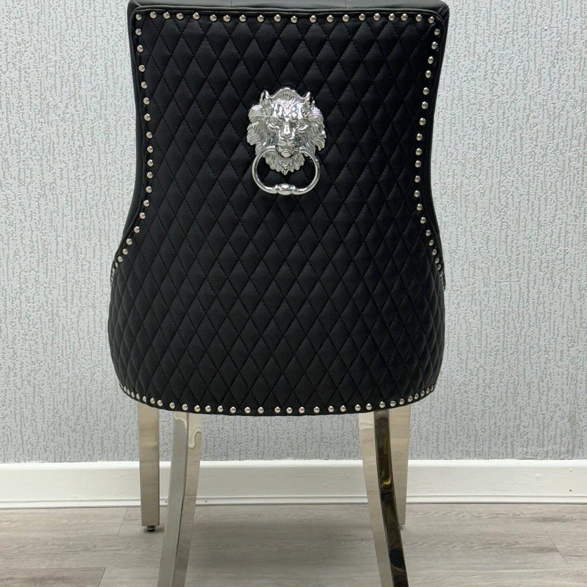 Majestic Midnight Black PU Leather Dining Chair Back View with Decorative Lion Knocker Detail from Solid Furniture UK