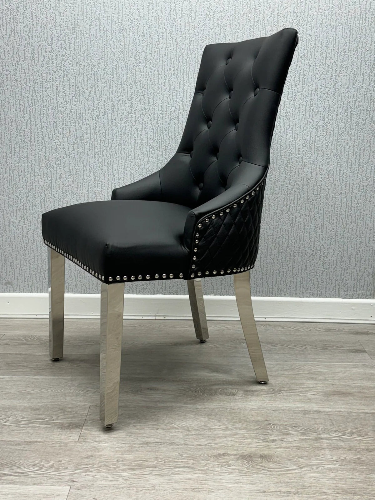 Majestic Midnight Black PU Leather Dining Chair Side View with Premium Leather Look Finish from Solid Furniture UK