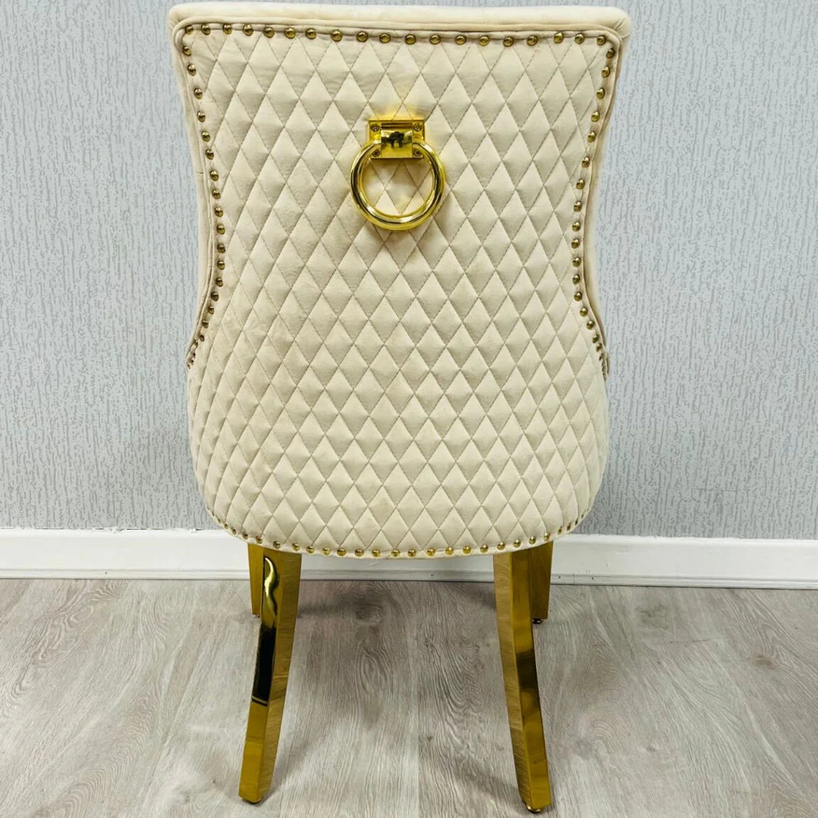 Back view of Majestic Mink Gold dining chair with high back upholstered design from Solid Furniture UK