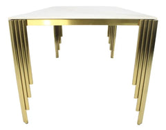 Close-up of sculptural gold legs on Mayfair dining table, Solid Furniture UK
