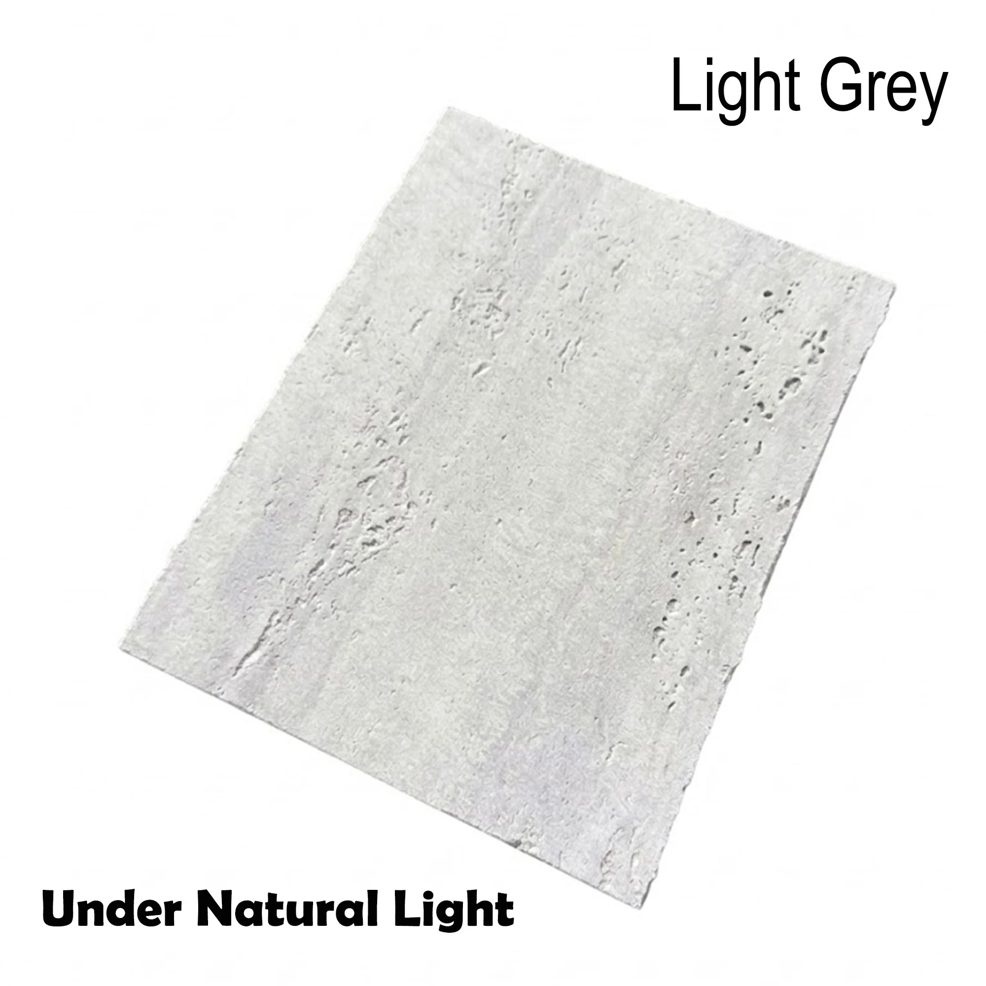 MCM Travertine stone sample in Light Grey shown under natural light, Solid Furniture UK