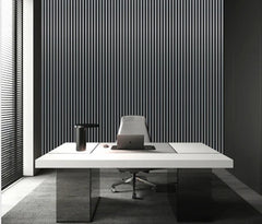Metallic dark grey slatted acoustic wall panel in a modern interior setting