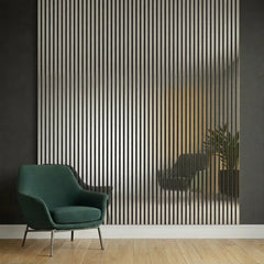Metallic dark grey slatted wall panels installed in a modern living room showing sleek vertical slats, contemporary industrial style, and acoustic sound absorption. solid furniture UK