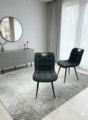 Black Monza fabric dining chair main front view with modern upholstered design from Solid Furniture UK