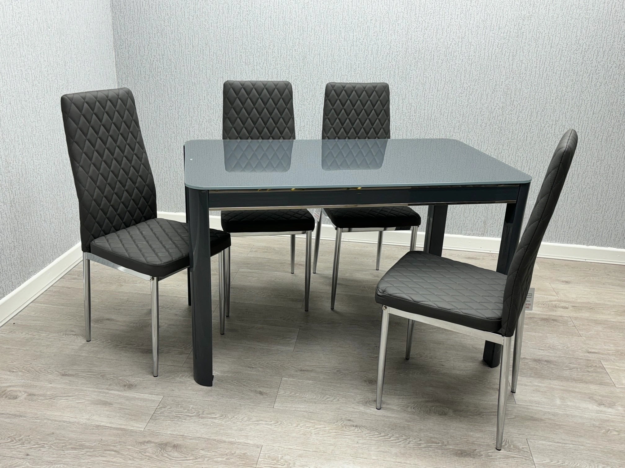 Morano Glass Dining Table with 4 California Chairs in Grey at Solid Furniture UK
