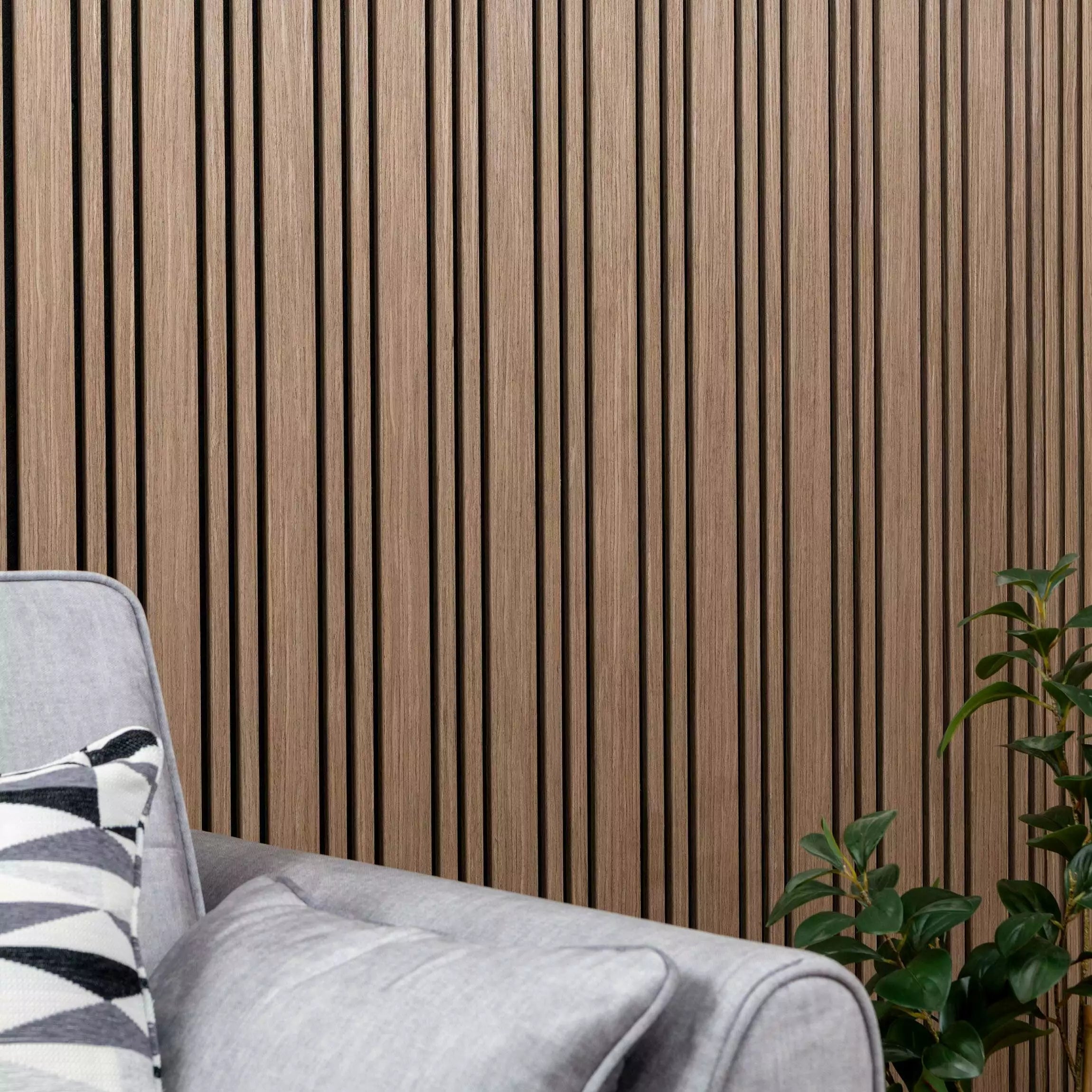 Elegant drawing room featuring dark oak slatted acoustic wall panels enhancing the space with a modern luxury feature wall design solid furniture UK