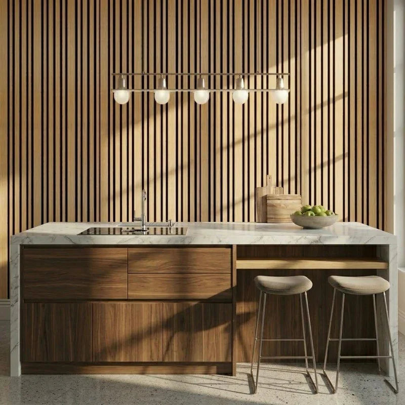 Modern UK kitchen featuring multi-width oak wall panels 60x240cm installed by Solid Furniture UK, enhancing style and acoustic comfort with a contemporary slatted design