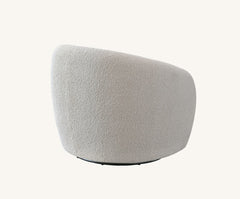 Back view of Nolita Bouclé Accent Chair showing curved ergonomic backrest and plush fabric UK solid furniture UK