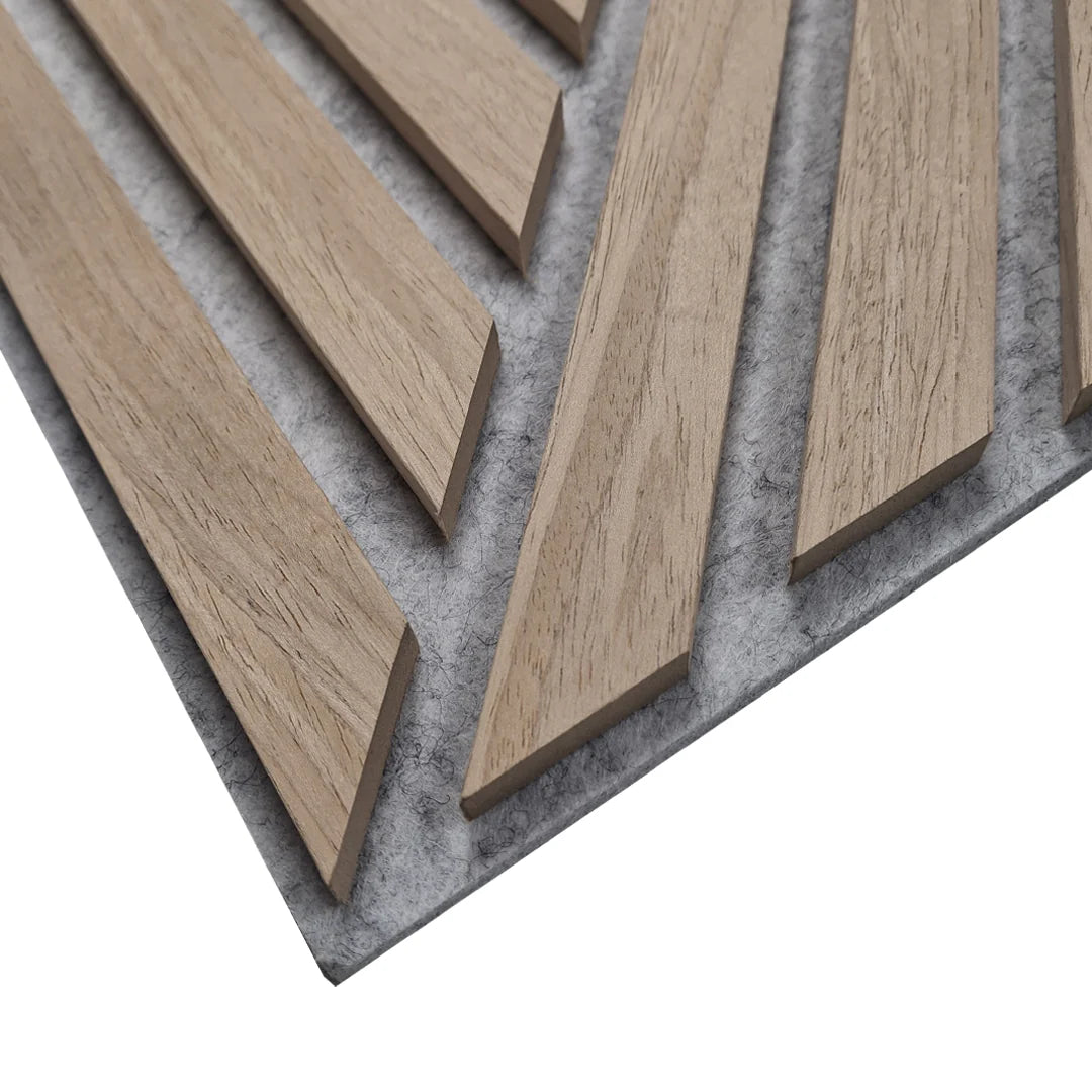 Close-up detail of oak veneer mixed slat acoustic wall panel by Solid Furniture UK showing natural wood grain and slat spacing on grey felt backing in UK interiors