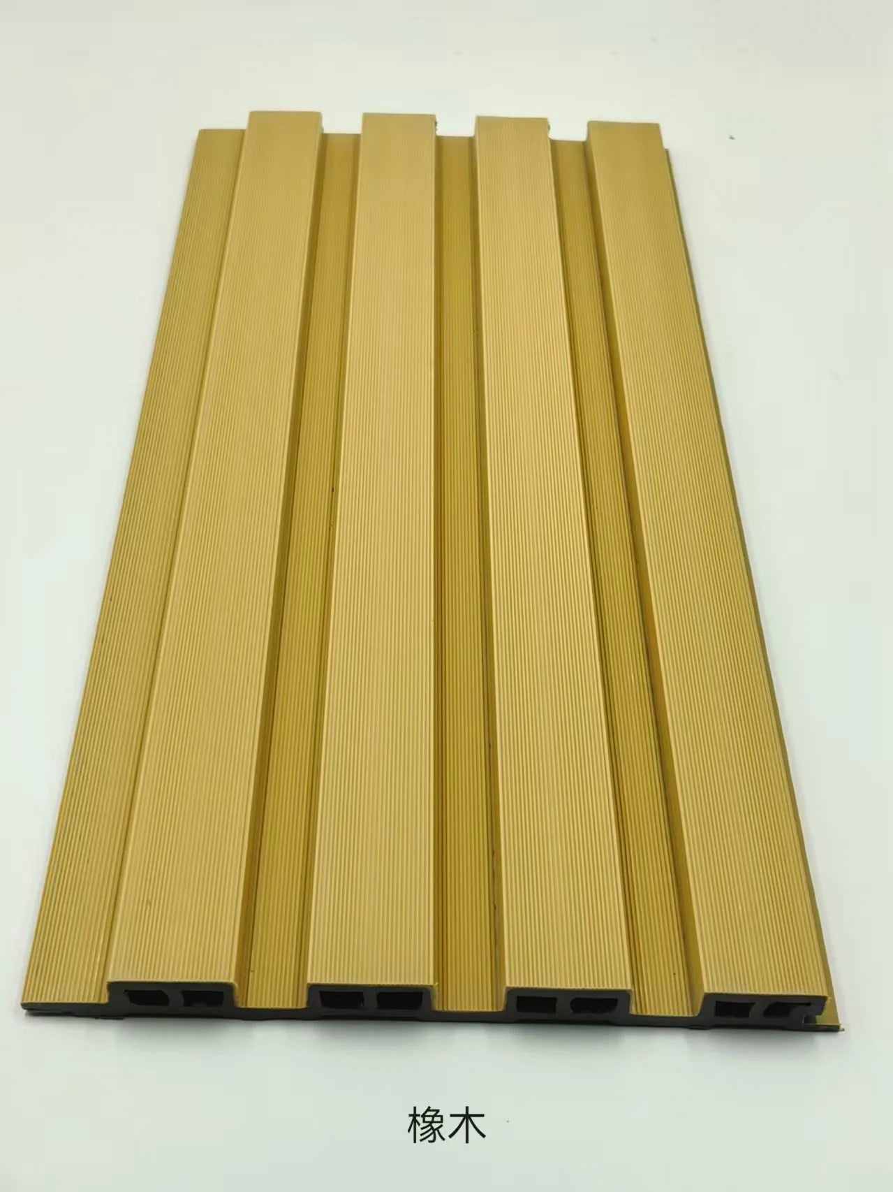 Oak outdoor wall panels 16x240cm pack of 12 by Solid Furniture LTD shown in main view with oak finish composite slats for exterior cladding