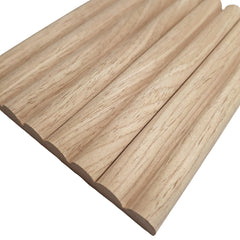 Oak Reed flexible wood veneer acoustic wall panels installed on curved interior wall solid furniture UK