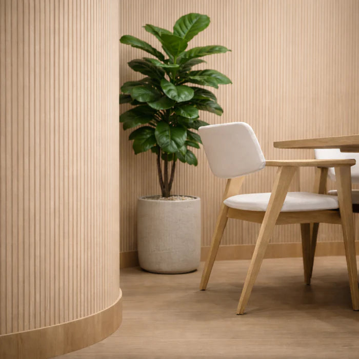 Flexible Oak Slat Wall Panels installed on a modern living room feature wall, showcasing seamless veneer finish and warm oak texture with soft ambient lighting solid furniture UK