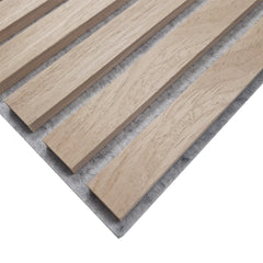 Close-up detail of oak straight slat acoustic wall panel by Solid Furniture UK for UK interiors showing natural wood grain texture, precise slat spacing, and acoustic felt backing.