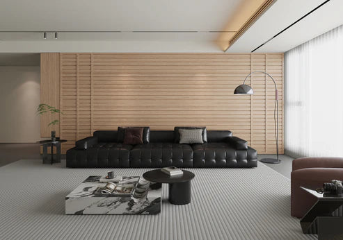 Vertical installation of oak WPC wall panels showing seamless tongue-and-groove finish solid furniture LTD