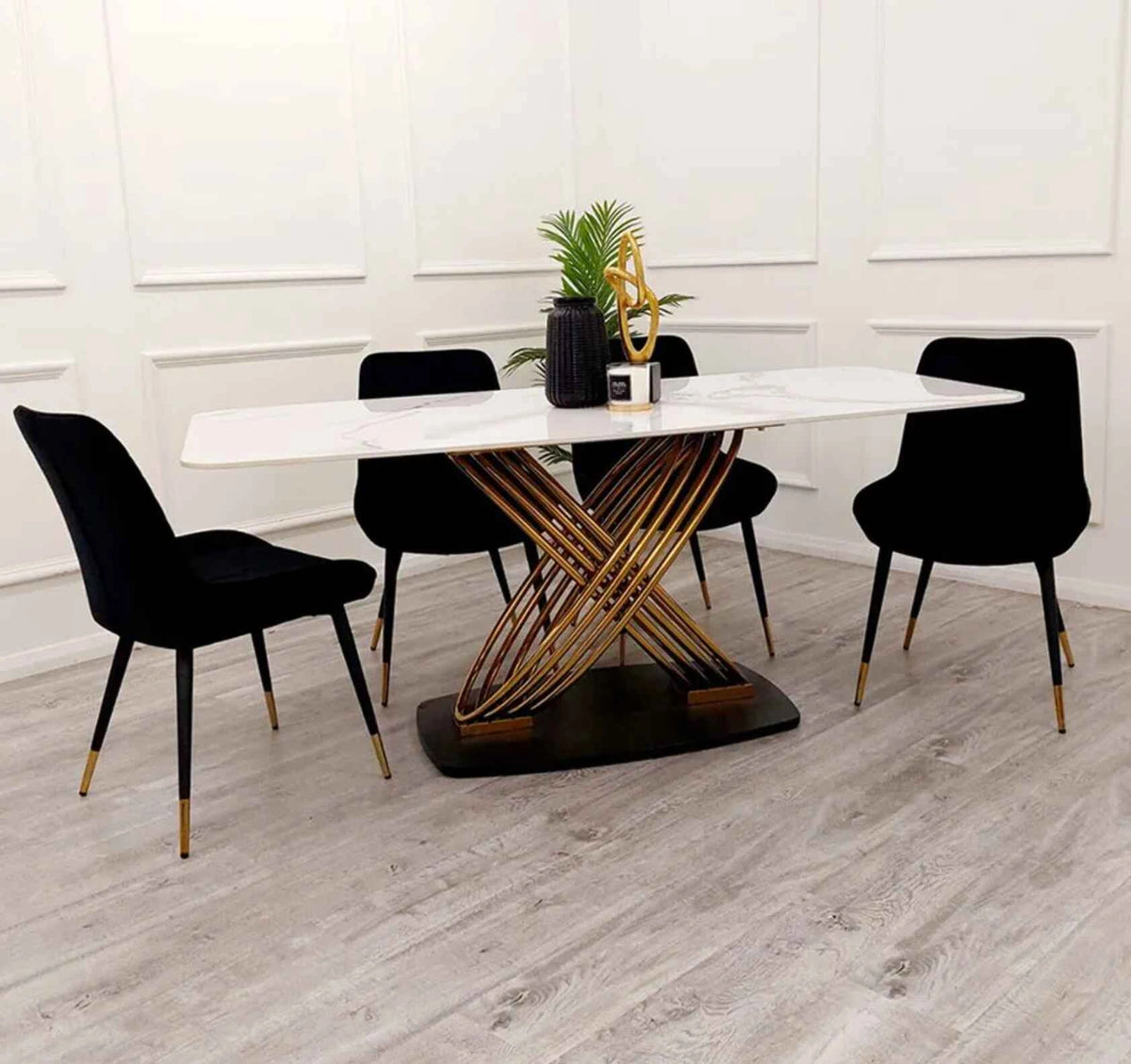 Orion Gold dining table with Black Luna velvet chairs from Solid Furniture UK modern luxury dining set main front view