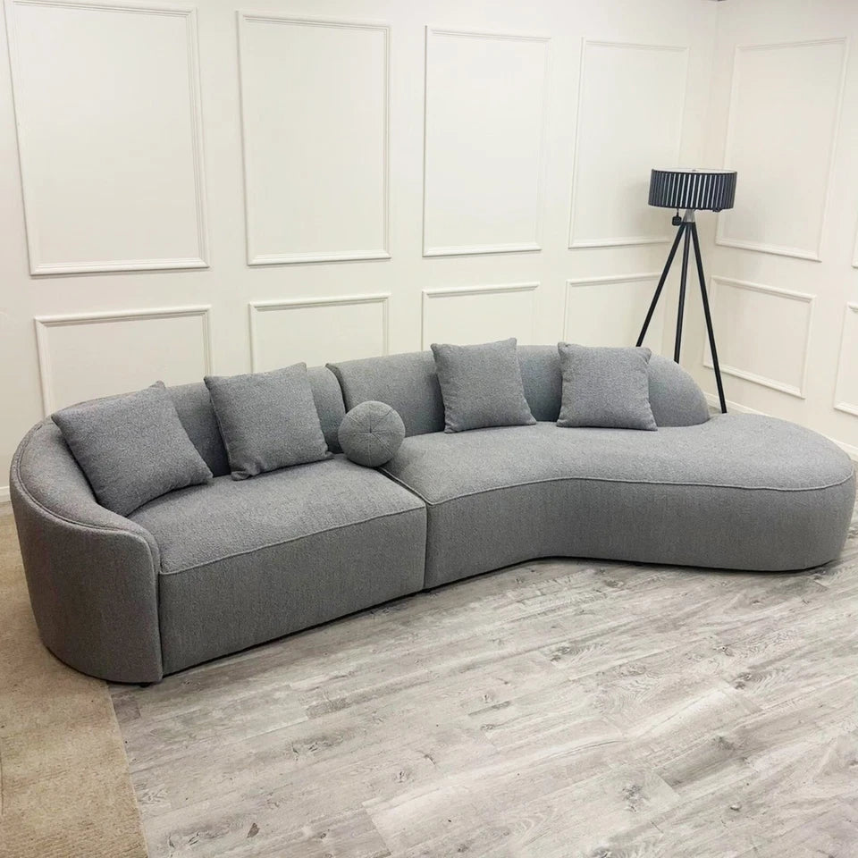 Pebble Bouclé Sofa side view – Elegant curved sofa showing arm height, back cushions, and deep seating solid furniture UK
